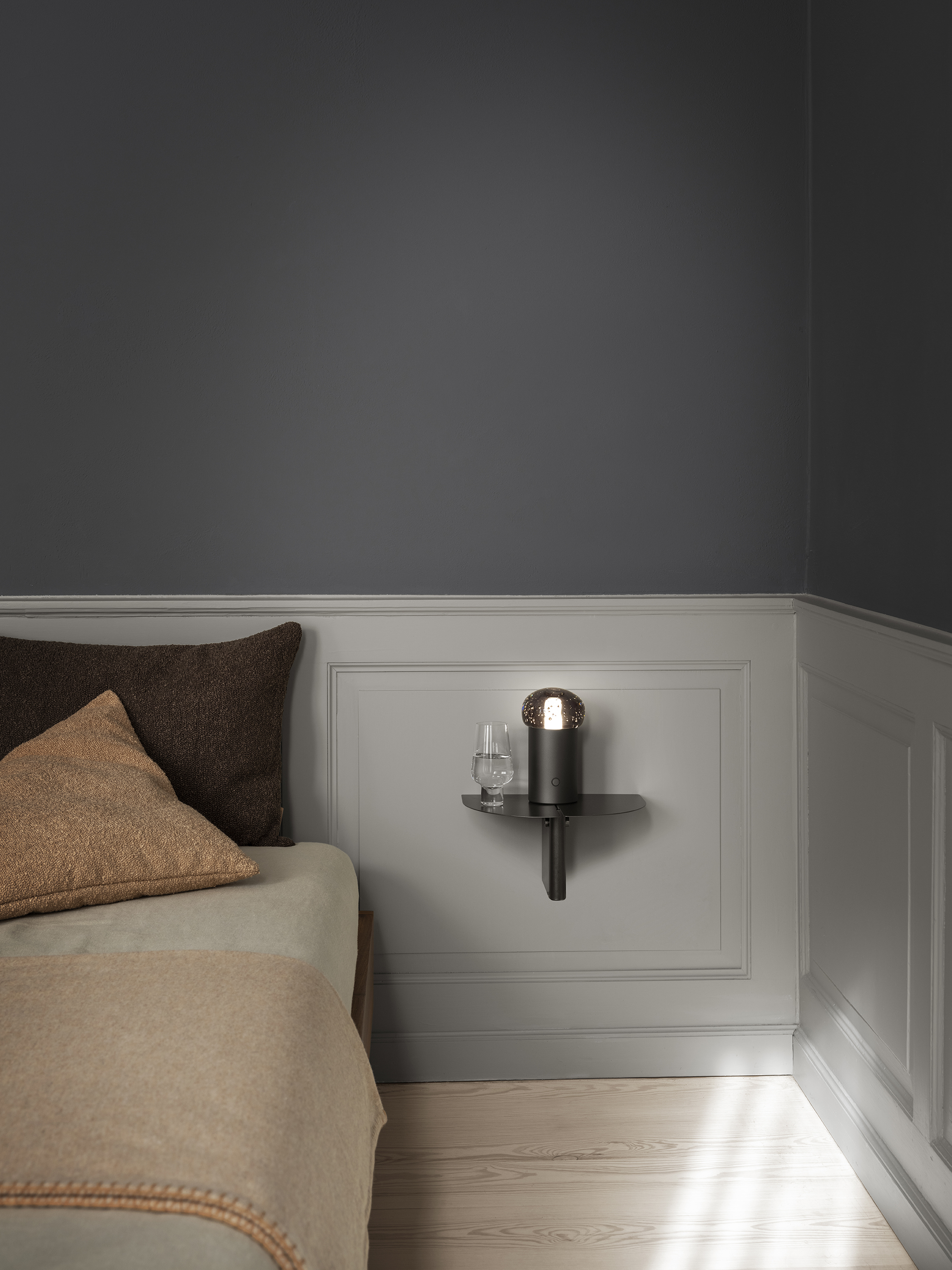 multiple wall shelfes hanging with decoration on it