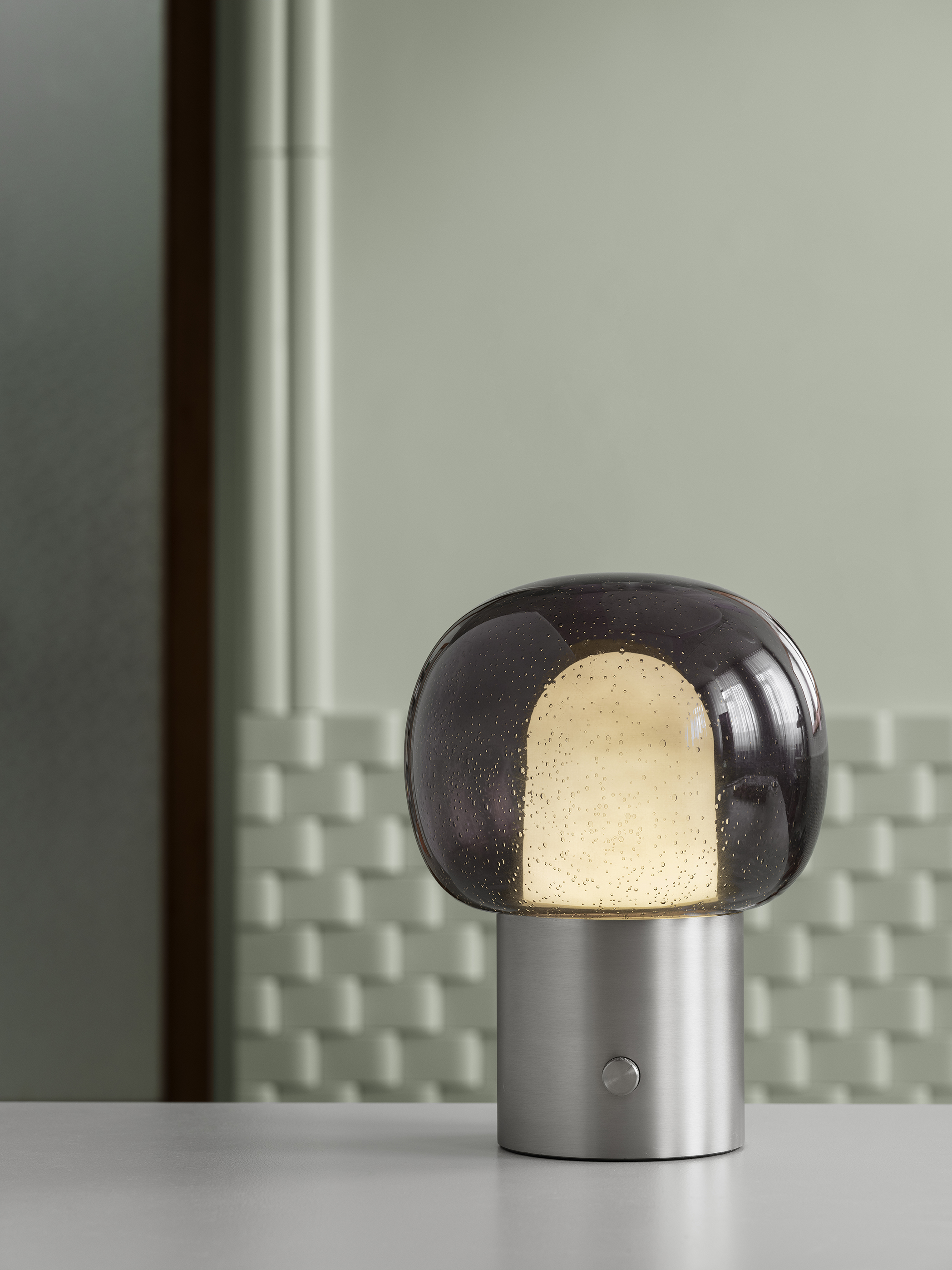 The IRIS light with rain drop inside on a green background